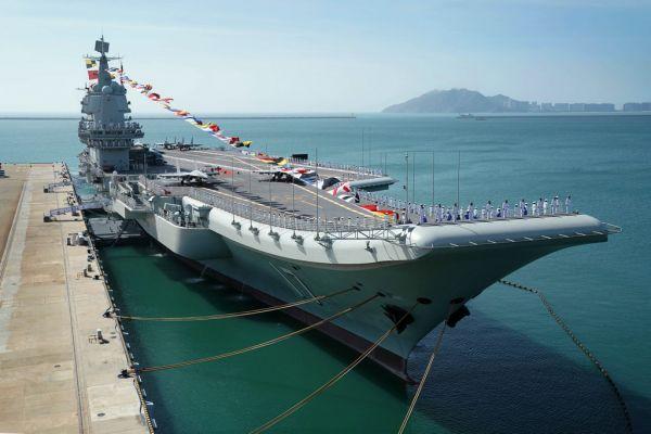 2019年12月17日，我国第一艘国产航空母舰山东舰在海南三亚某军港交付海军。新华社