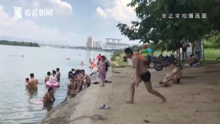 上百人违规野泳 上百人违规野泳