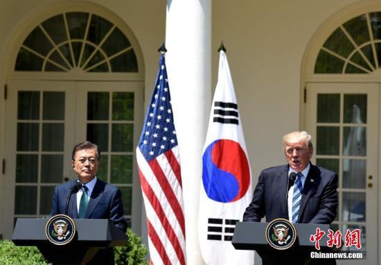 韩美领导人讨论半岛局势 重申通过制裁遏制朝