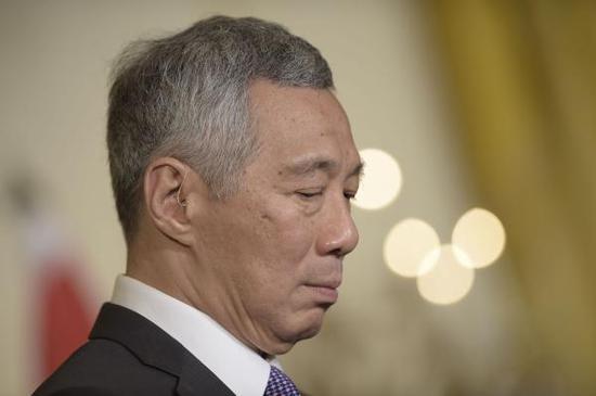 李显龙继续接受质询 家族内斗被批像马戏团演出_新闻频道_中国青年网