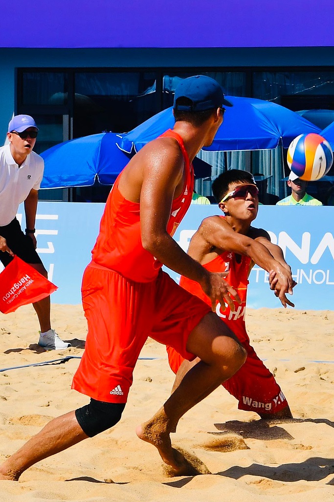 杭州亚运会首个比赛日,中国沙滩排球队三战全胜